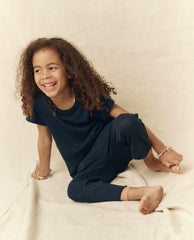 The Great. Tees &amp; Sweats | The Little Jersey Crop. True Navy - Kids